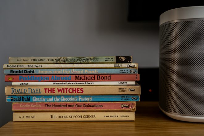 Kids books stacked on a table